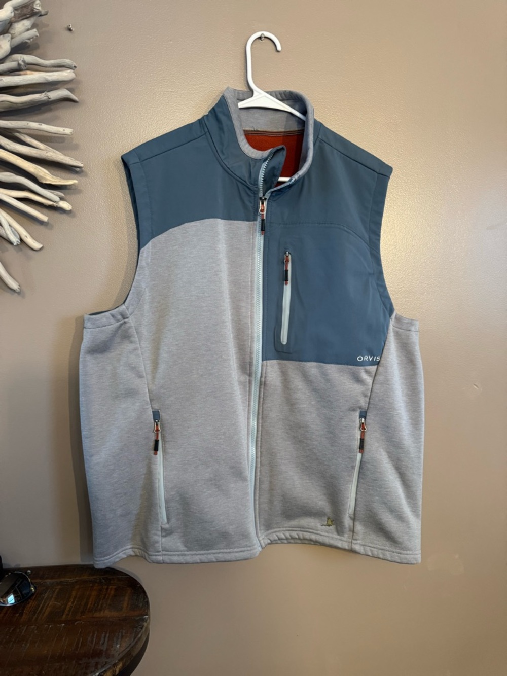 Orvis men's hybrid or sweater fleece vest featuring a two-tone blue‎ and grey